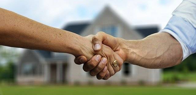 handshake over a Quick Sale Property Portland.